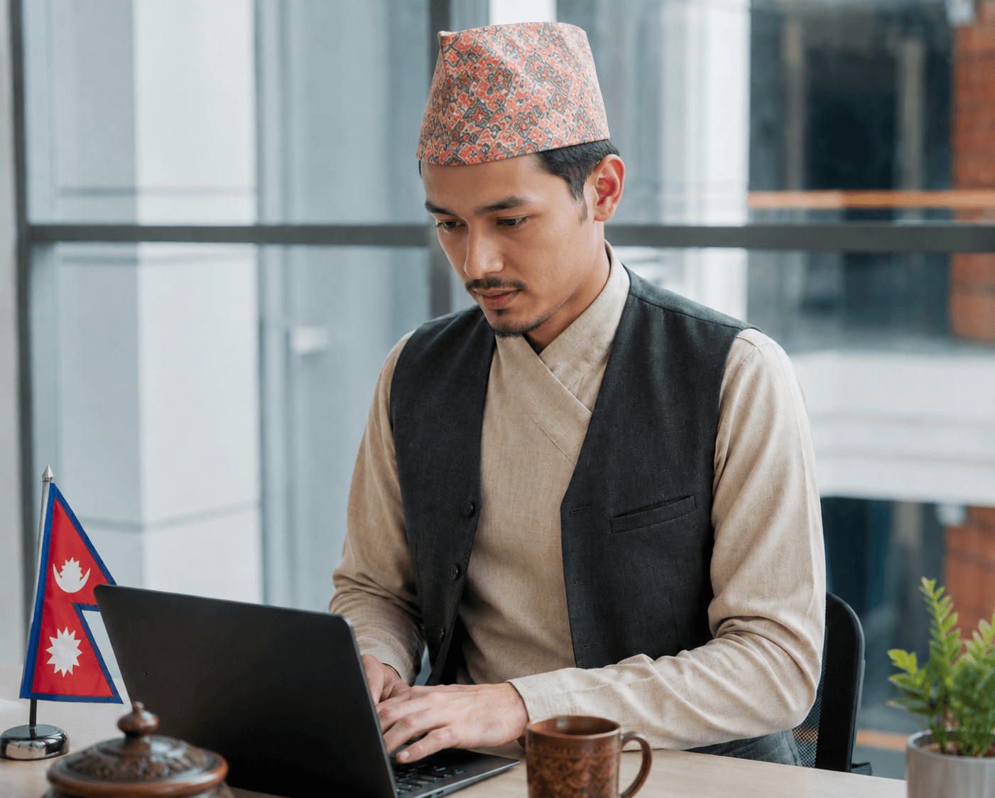 Business owner reviewing accounts on a laptop